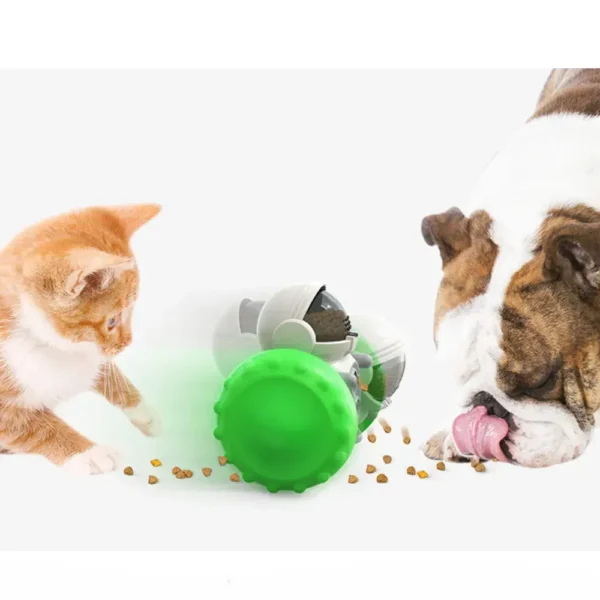 10001 Cat pawing at interactive robot pet toy to release treats