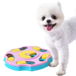 Dog playing with adjustable treat dispenser enrichment feeder toy indoors