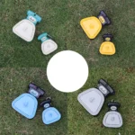 10001 Pet owner using portable poop scooper for dog waste cleanup outdoors