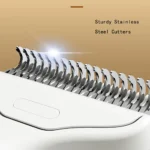 Close-up view of stainless-steel teeth grooming rake for deshedding cats and dogs
