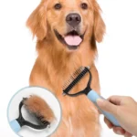 Pet grooming brush in use, removing loose hair and knots from cat and dog fur