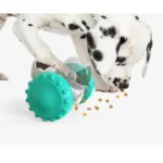 10002 Dog playing with robot shaped interactive tumbler toy food dispenser