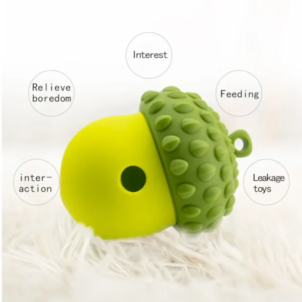 10003 Berry-shaped silicone slow feeder toy dispensing treats during dog playtime
