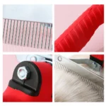 Close-up of rounded stainless steel pins and ergonomic anti-slip rubber handle on large pet rake comb grooming brush