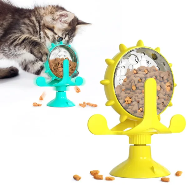 10003 Cat playing with suction cup treat dispenser puzzle feeder at home