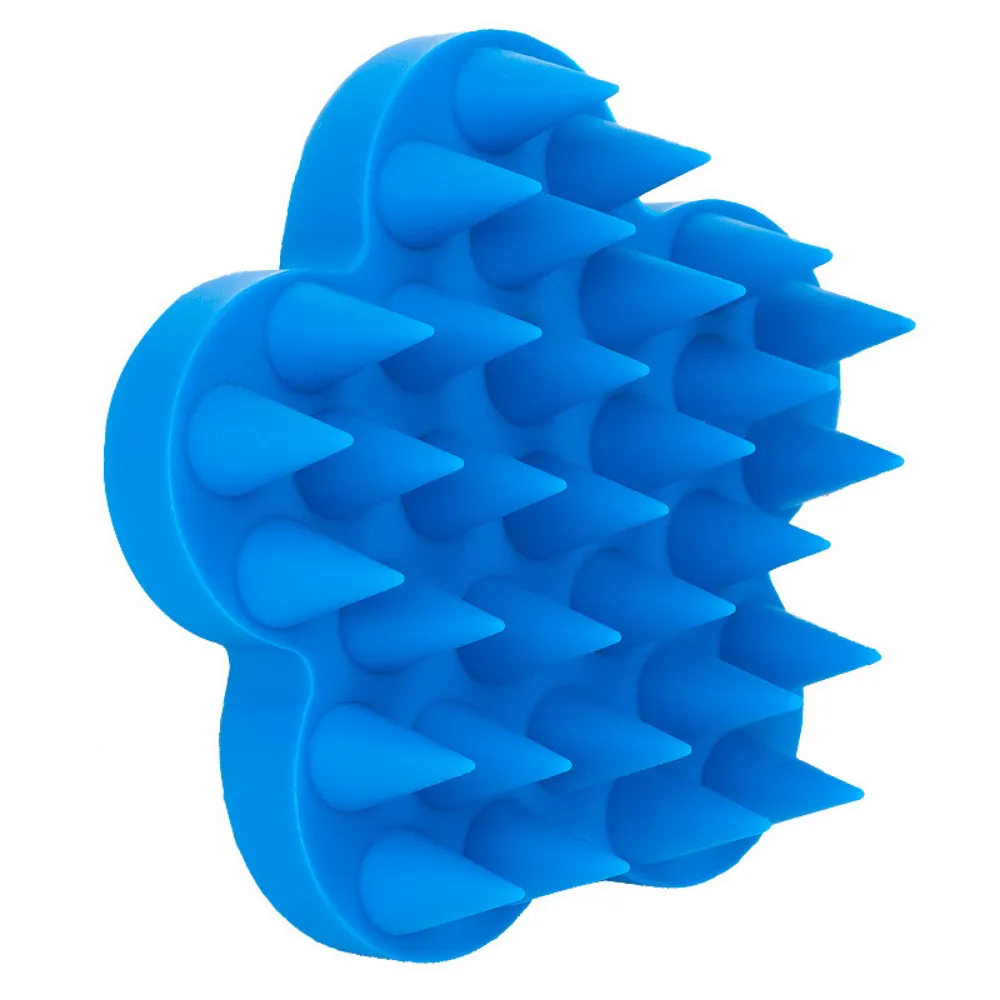 Flower-shaped silicone pet brush in cyan blue for gentle grooming and bathing