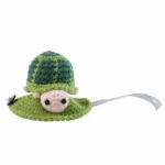 10004 Small dog wearing hand-knitted turtle outfit showing comfortable fit