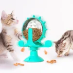 10004 Cat playing with suction cup treat dispenser puzzle feeder at home