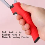 10005 Close-up of rounded stainless steel pins and ergonomic anti-slip rubber handle on large pet rake comb grooming brush