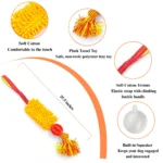 10005 Close-up view of treat dispensing ball and soft plush mop section on durable dog tug toy