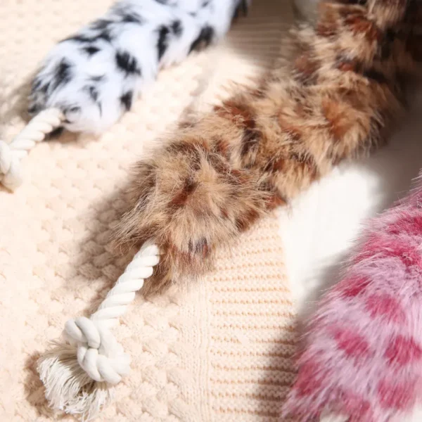 10007 Dog playing with plush rope chew toy – wholesale interactive pet supplies for retailers