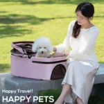10008 Pet owner walking dog in deluxe foldable stroller with 4 wheels in an outdoor park