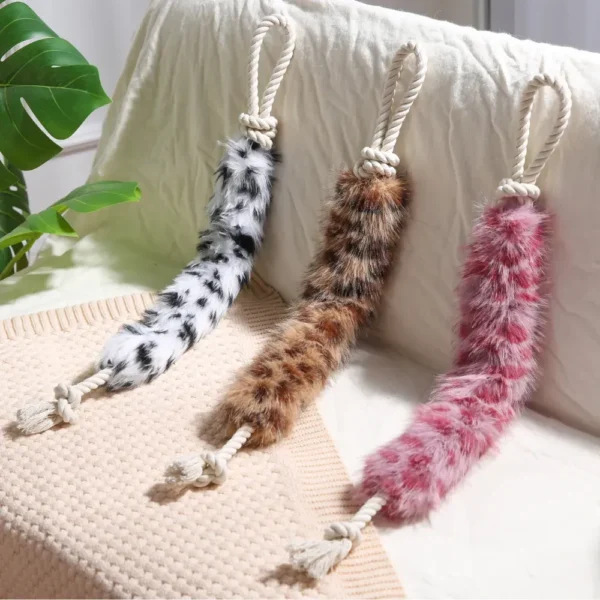 10008 Dog playing with plush rope chew toy – wholesale interactive pet supplies for retailers