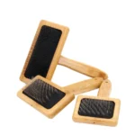 10010 Bamboo fine-toothed pet needle combs displayed on shelf in pet store for retail sale