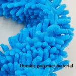 10001 Close-up of TPR dog toy ball with plush rope tug detail"