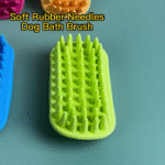10001 Rubber grooming brush massaging pet skin and removing loose fur during bath