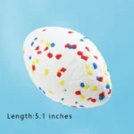 10003 Dog playing fetch with 5 inch rugby floating ball in outdoor park