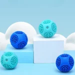 Floating squeaky dog ball providing interactive play and exercise
