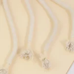 10007 Close-up of plush carrot-shaped cat toy with chew rope tail