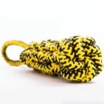 Close-up of strong braided cotton dog rope toy showing durable texture for chewing and tugging