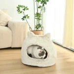 10007 Cat resting inside cozy ear-shaped cave bed, ideal wholesale pet bed for pet stores and retailers.