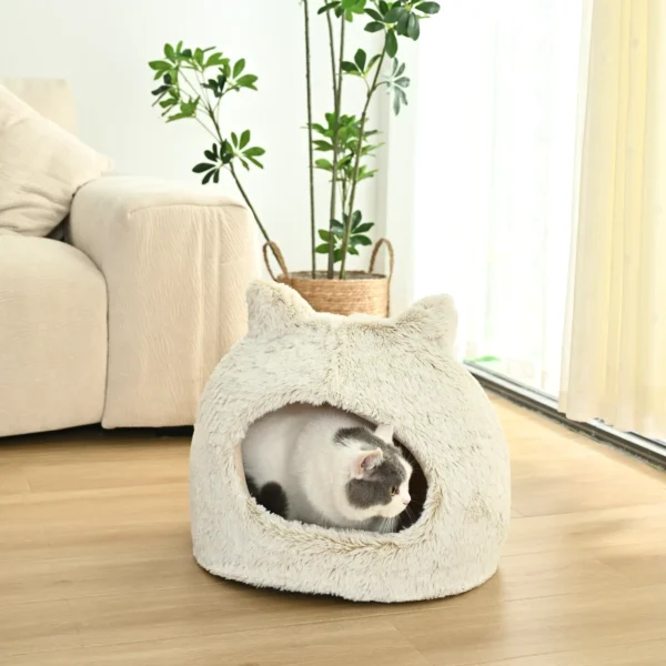 10007 Cat resting inside cozy ear-shaped cave bed, ideal wholesale pet bed for pet stores and retailers.