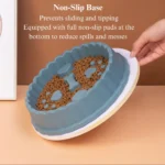 Cat using non-slip slow feeder bowl in home environment