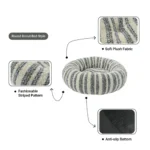 bb7def9acaa18063d0a56877c9089cd5 Close-up view of striped plush fabric on donut-shaped pet bed XS size.