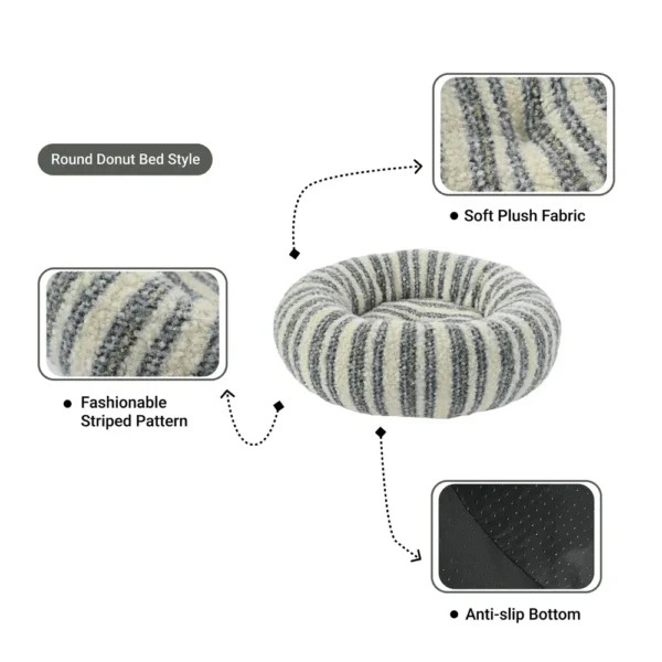 bb7def9acaa18063d0a56877c9089cd5 Close-up view of striped plush fabric on donut-shaped pet bed XS size.