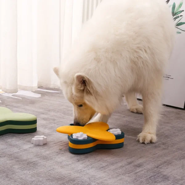 10005 Dog playing with interactive puzzle feeder toy for mental stimulation and slow feeding