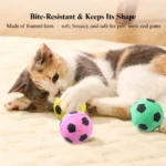 69b30b1c98a9b7527fe23fc18bd93b2d Cat chasing lightweight foam soccer toy ball, demonstrating bounce and interactive movement.