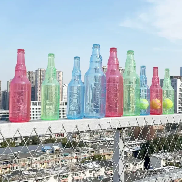 a242816bcd08a1a91ae75f51f2900c8f Dog Playing with Floating Bottle Chew Toy Outdoors