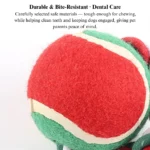 f8ae457a775e0ea1fa984bc85cb8eb5c Close-up of durable cotton rope and tennis ball texture on Christmas dog toy